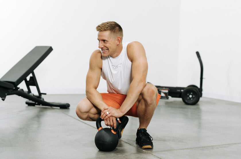Brent Fikowski Smiling With Orange Torque Kettlebell <black>